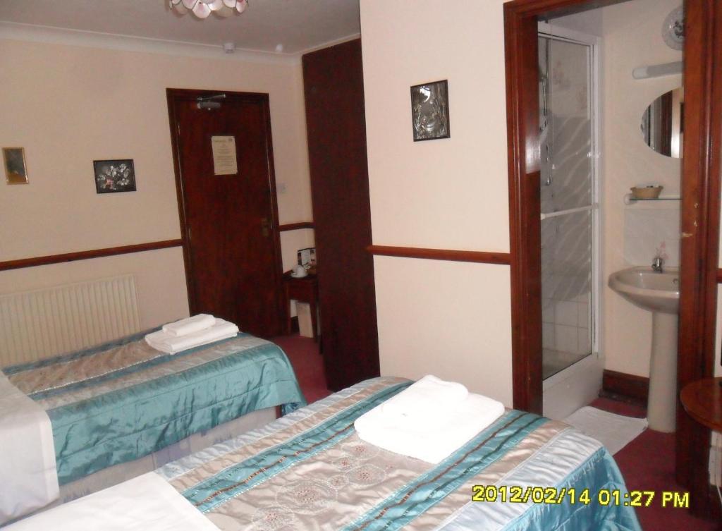 Thorpe Lodge Hotel Питерборо Стая снимка